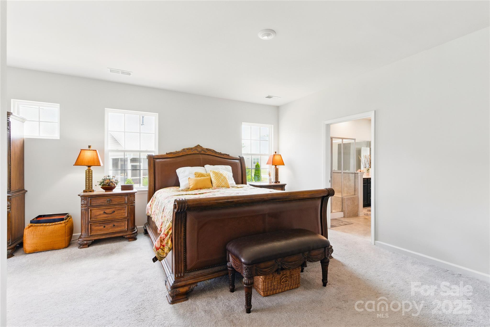 4069 Havenport Circle Tega Cay, SC 29708 - Photo 20 of 48 a bed room with a bed and a table