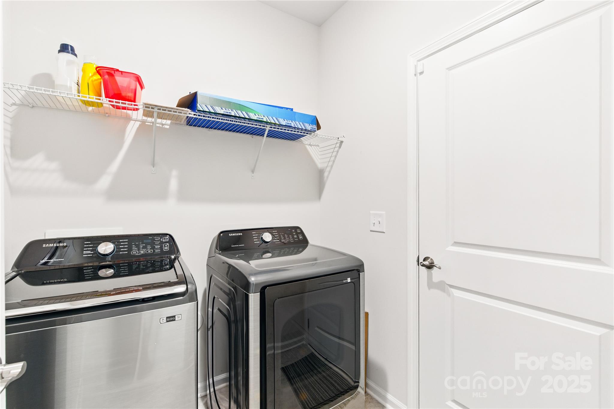 4069 Havenport Circle Tega Cay, SC 29708 - Photo 31 of 48 a utility room with dryer and washer