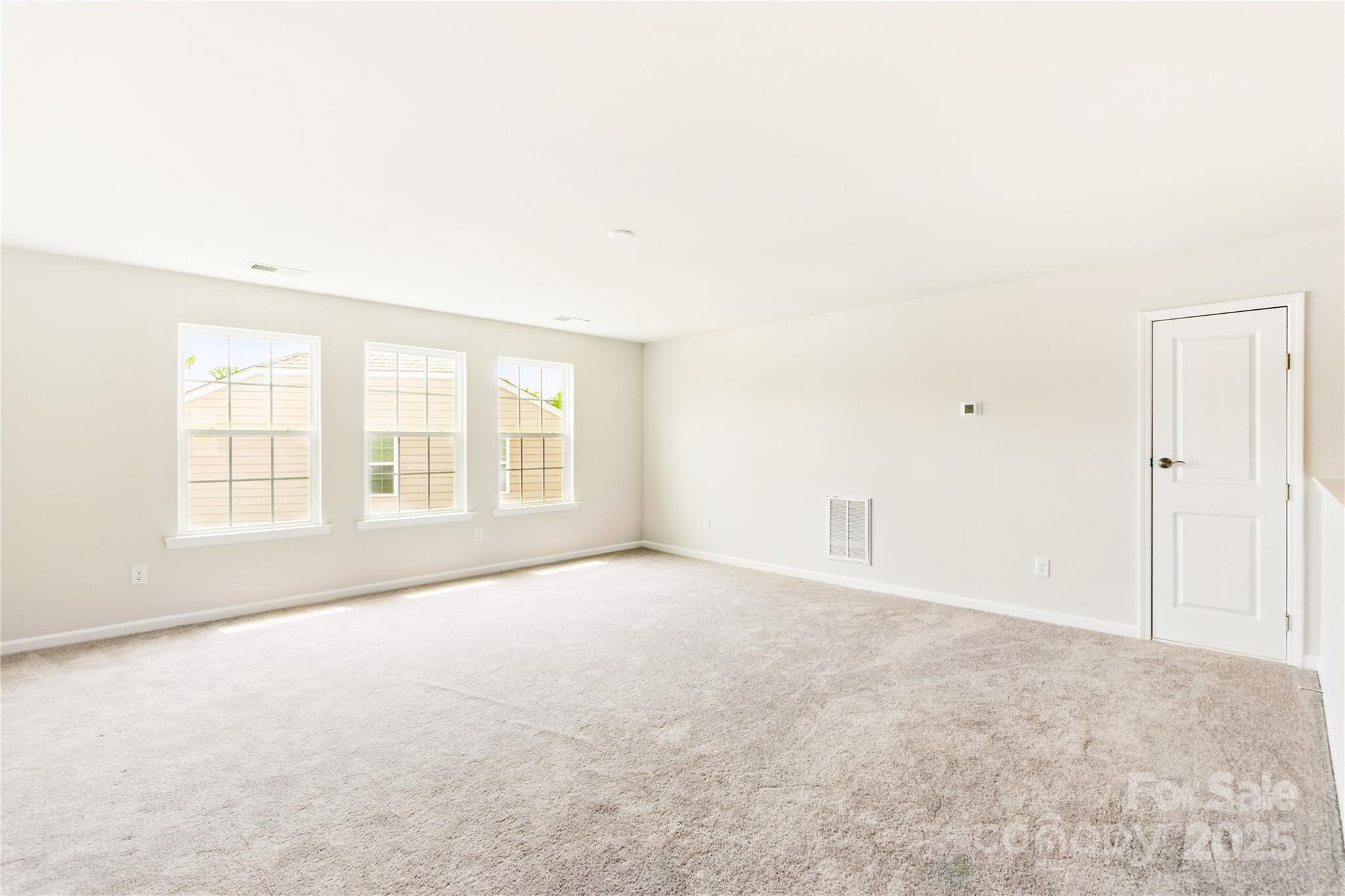 4069 Havenport Circle Tega Cay, SC 29708 - Photo 35 of 48 an empty room with windows