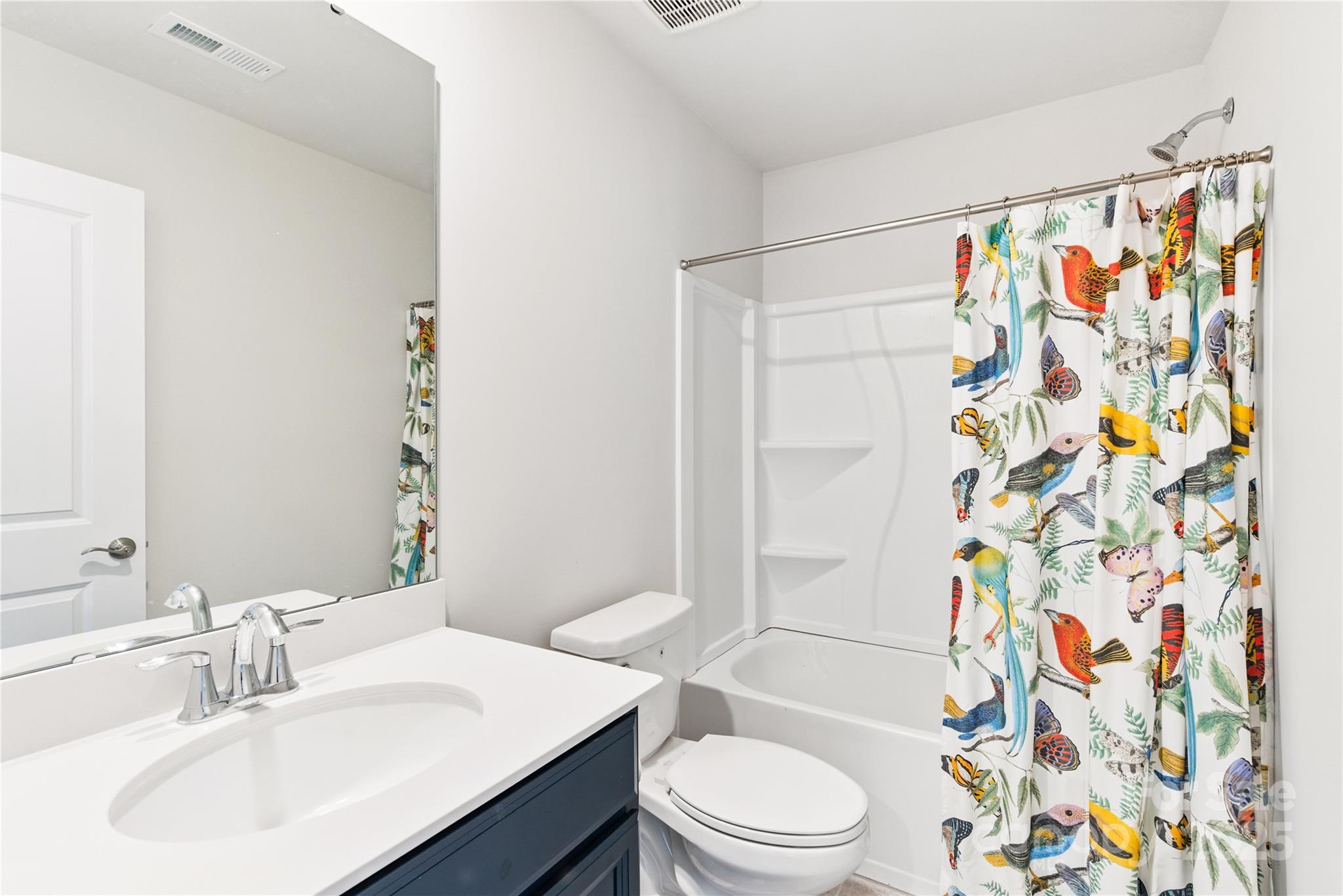 4069 Havenport Circle Tega Cay, SC 29708 - Photo 36 of 48 a bathroom with a sink a toilet and shower