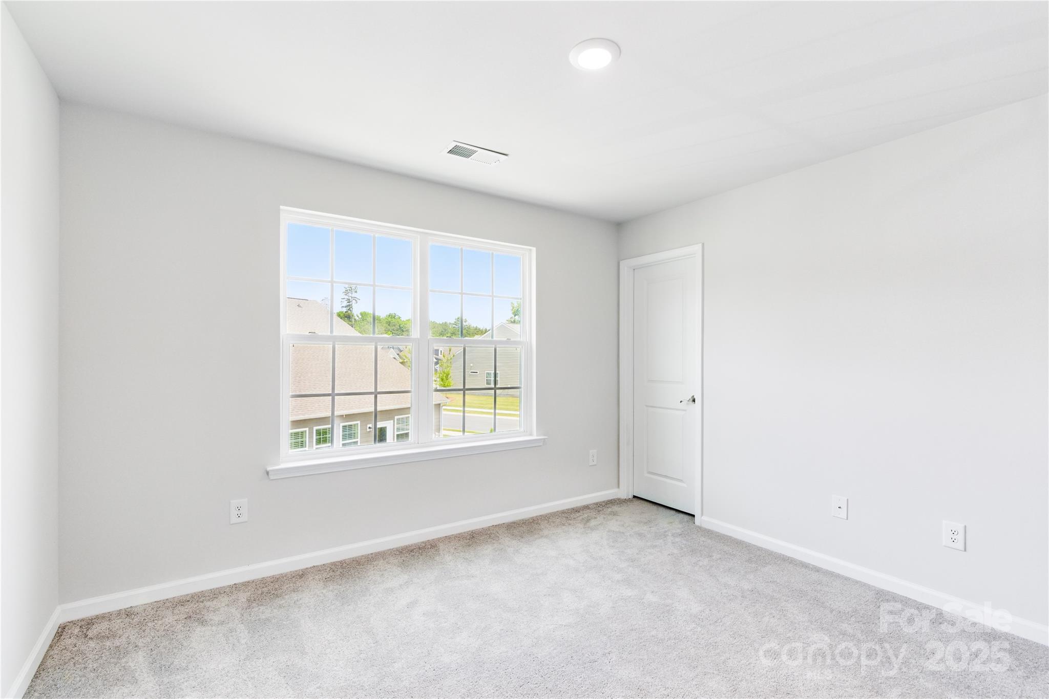 4069 Havenport Circle Tega Cay, SC 29708 - Photo 37 of 48 an empty room with windows