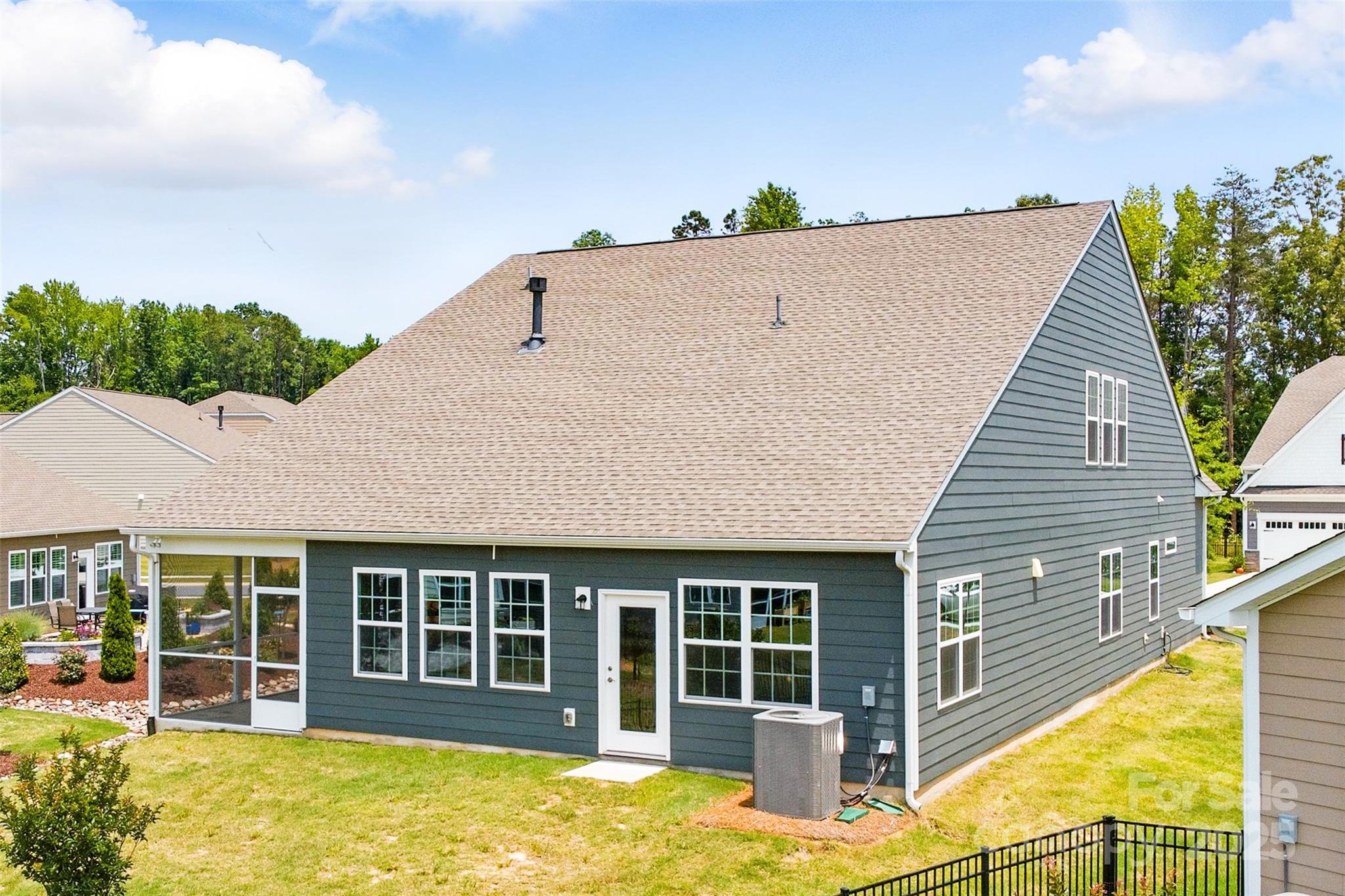 4069 Havenport Circle Tega Cay, SC 29708 - Photo 39 of 48 a view of a house with a backyard