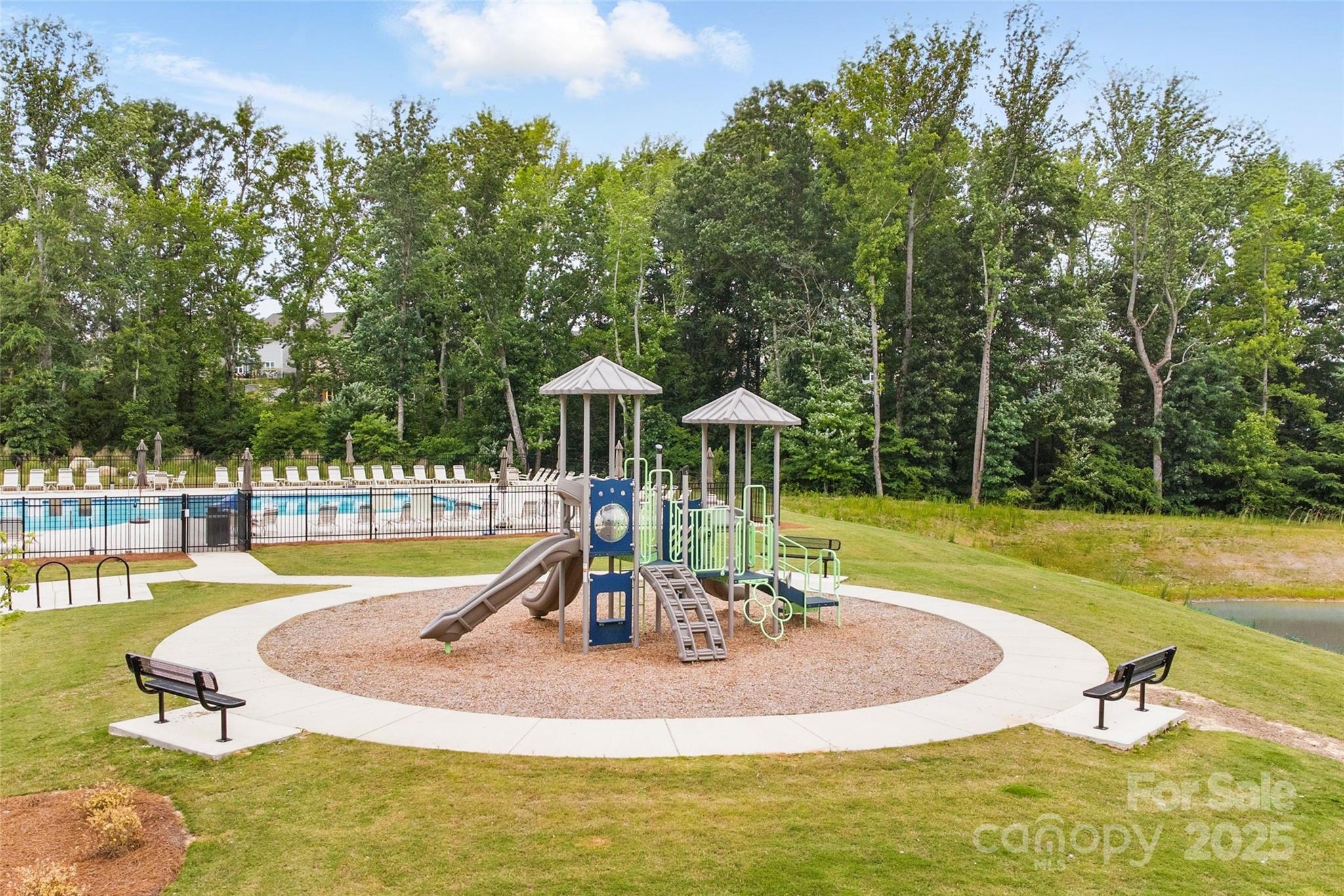 4069 Havenport Circle Tega Cay, SC 29708 - Photo 42 of 48 a view of a swimming pool with a patio