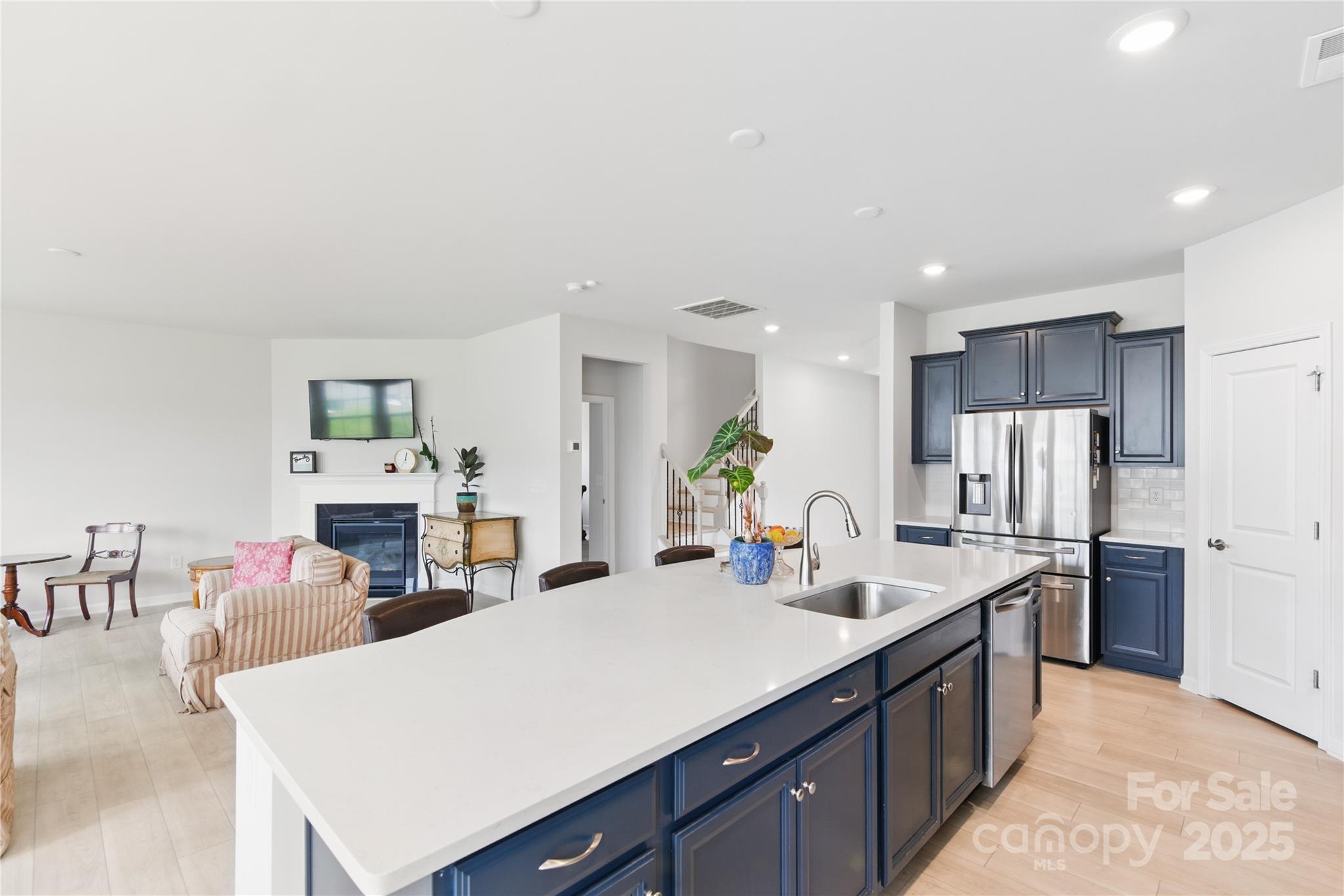4069 Havenport Circle Tega Cay, SC 29708 - Photo 7 of 48 a kitchen with stainless steel appliances a sink stove and refrigerator