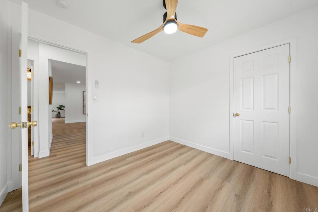 508 Village View Place Fallbrook, CA 92028 - Photo 23 of 32 a view of a hallway with wooden floor