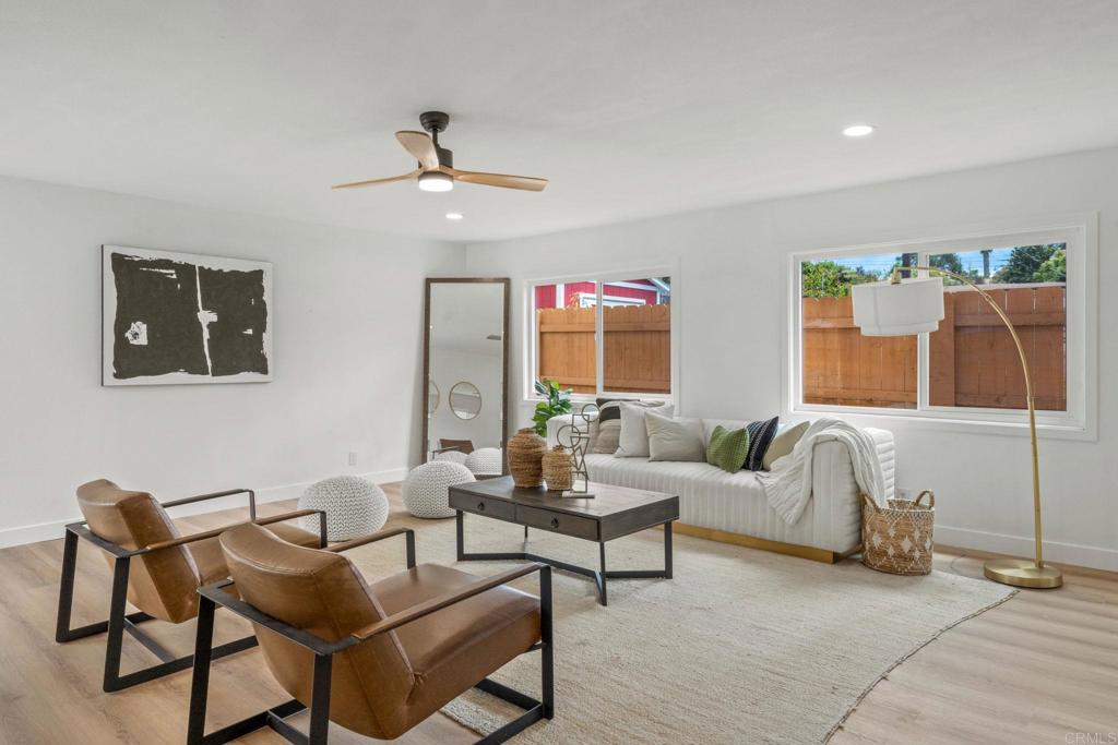 508 Village View Place Fallbrook, CA 92028 - Photo 3 of 32 a living room with furniture and a ceiling fan