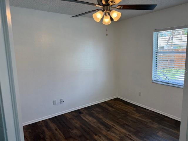 3407 Fox Ridge Street Winter Haven, FL 33884 - Photo 11 of 16 a view of a room with a window and a chandelier fan