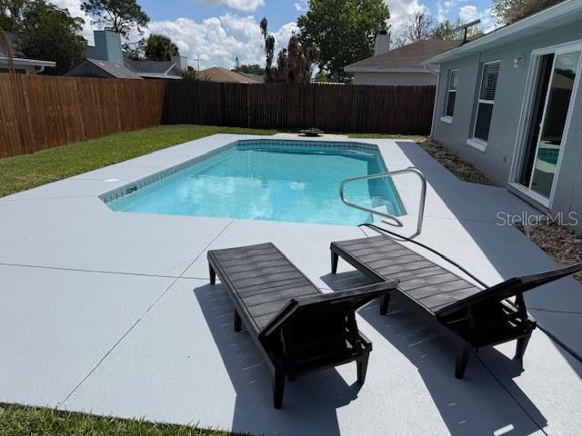 3407 Fox Ridge Street Winter Haven, FL 33884 - Photo 13 of 16 a view of a backyard with furniture
