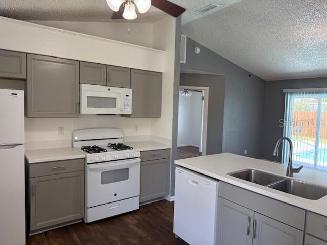 3407 Fox Ridge Street Winter Haven, FL 33884 - Photo 7 of 16 a kitchen with a sink stove and cabinets