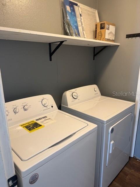 3407 Fox Ridge Street Winter Haven, FL 33884 - Photo 8 of 16 a utility room with dryer and washer
