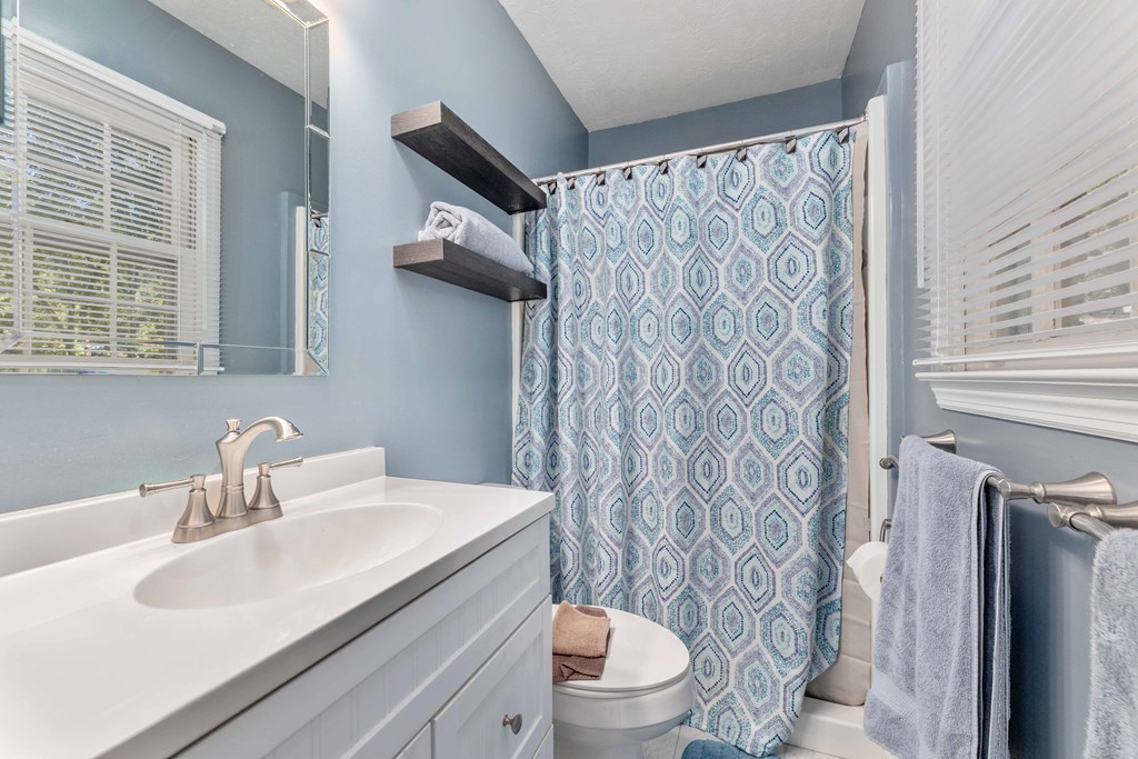 4807 Fairview Drive Columbus, GA 31907 - Photo 14 of 24 a bathroom with a sink toilet and shower