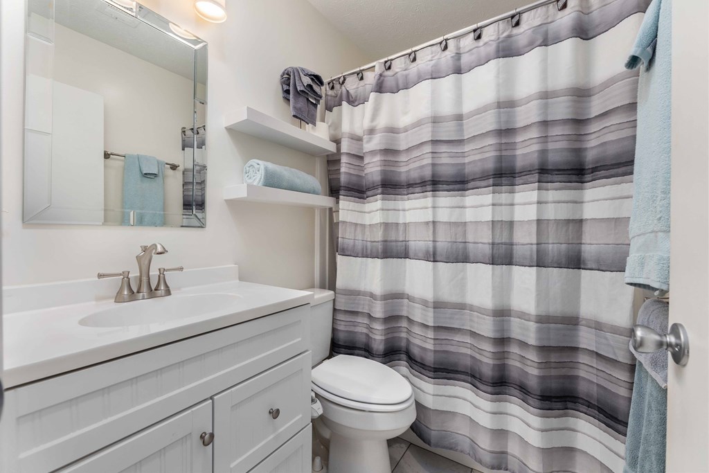 4807 Fairview Drive Columbus, GA 31907 - Photo 16 of 24 a bathroom with a sink toilet and shower