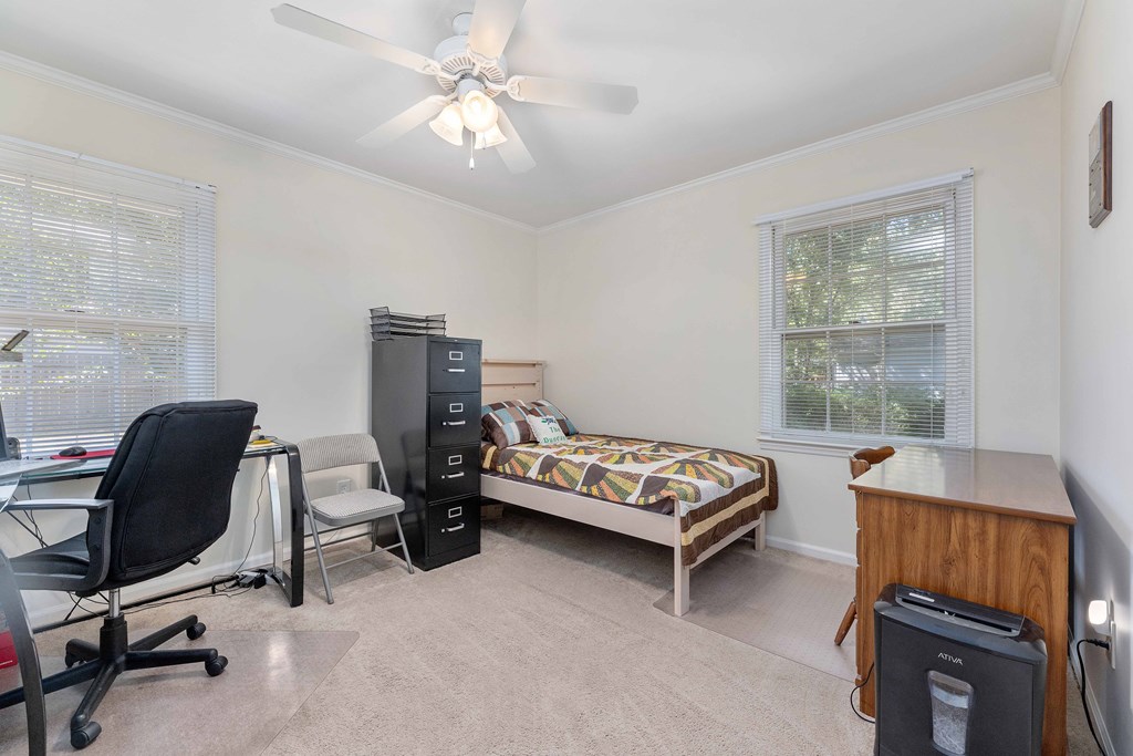 4807 Fairview Drive Columbus, GA 31907 - Photo 17 of 24 a bedroom with furniture and a window