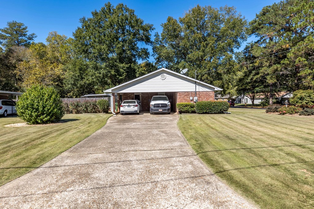 4807 Fairview Drive Columbus, GA 31907 - Photo 24 of 24 a front view of a house with a yard and trees