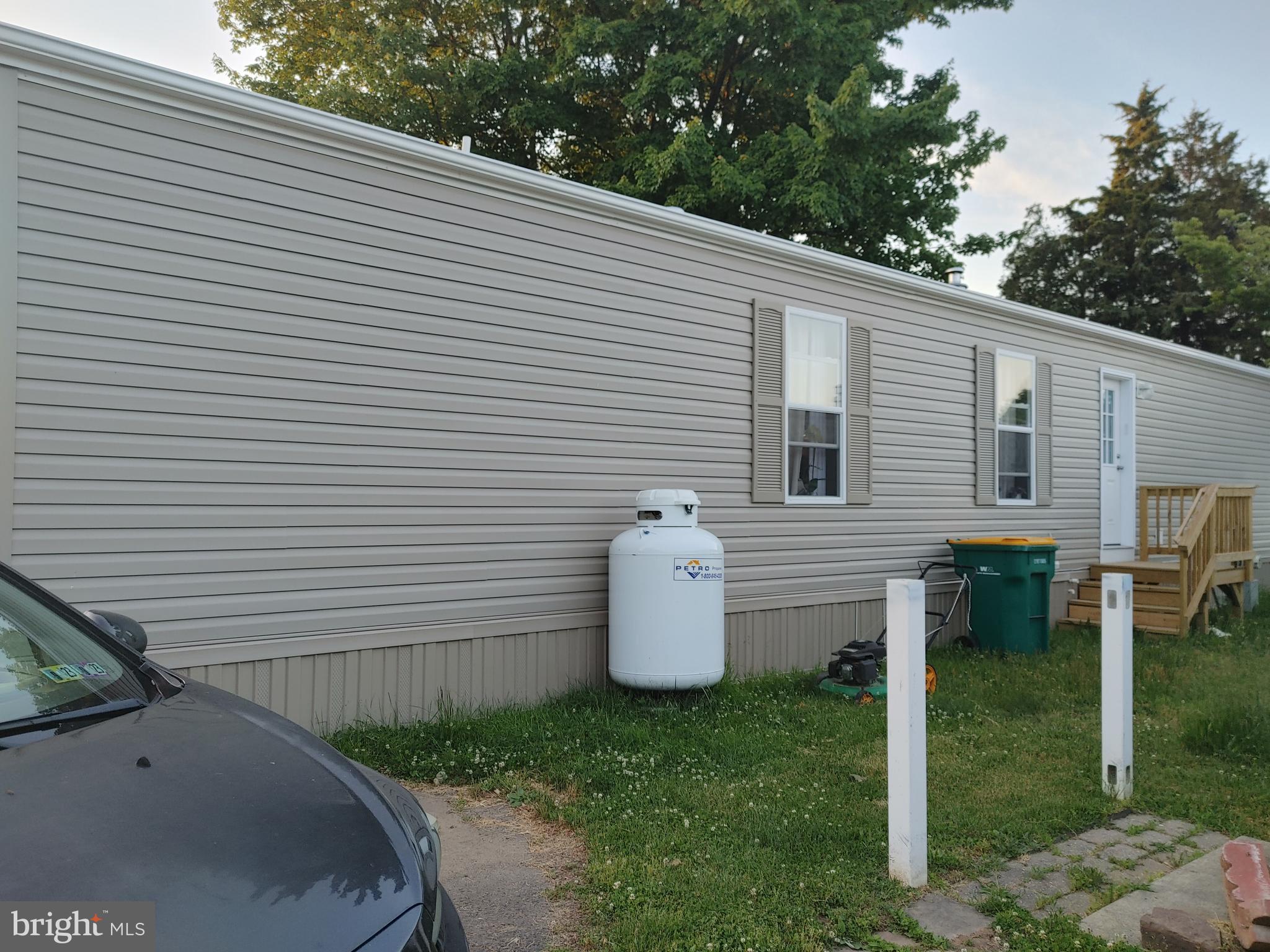 1446 Gibson Road, Unit D50 Bensalem, PA 19020 - Photo 6 of 8 a view of a backyard with plants and backyard