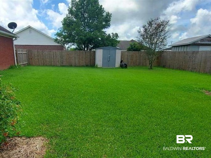 22055 Buck Road Robertsdale, AL 36567 - Photo 16 of 17 storage shed backyard