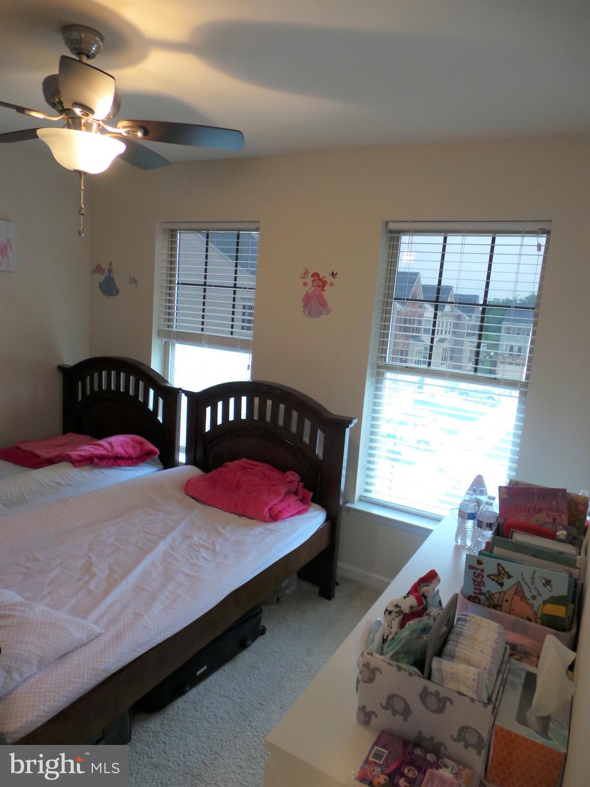 25278 Arrowroot Terrace Chantilly, VA 20152 - Photo 27 of 30 a bedroom with furniture and a window