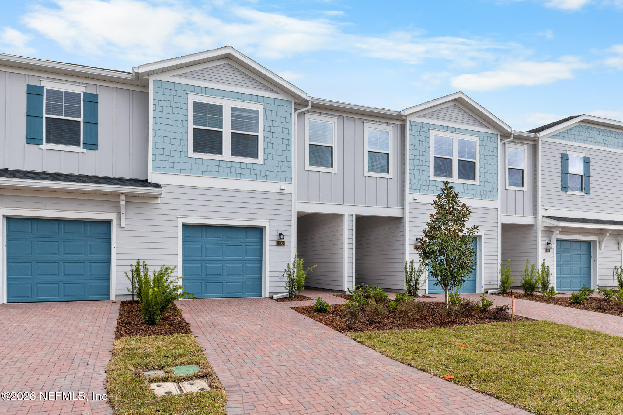 25 Craig Court St. Augustine, FL 32092 - Photo 2 of 25 a front view of a house with a yard and garage