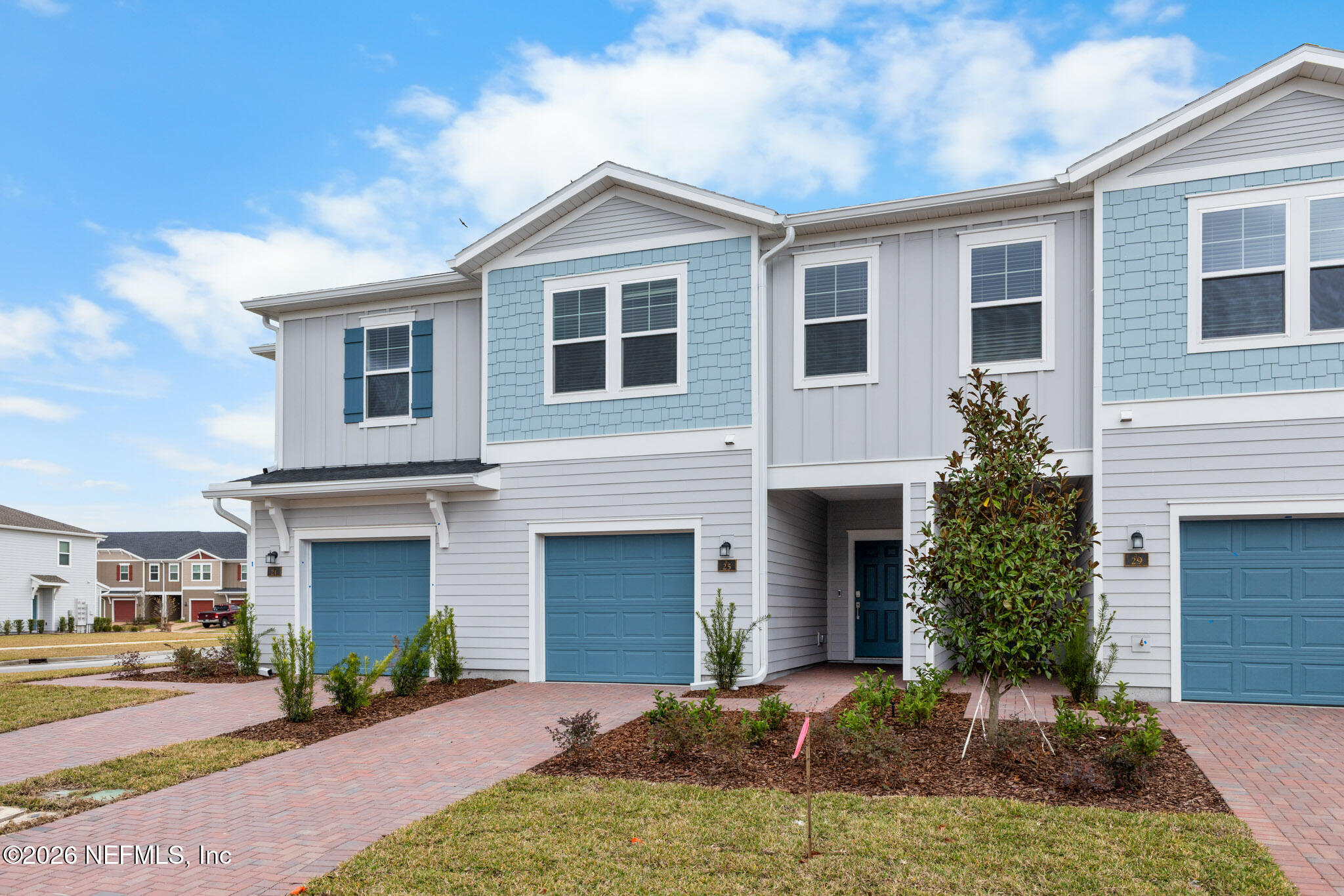 25 Craig Court St. Augustine, FL 32092 - Photo 3 of 25 a front view of a house with a yard and garage