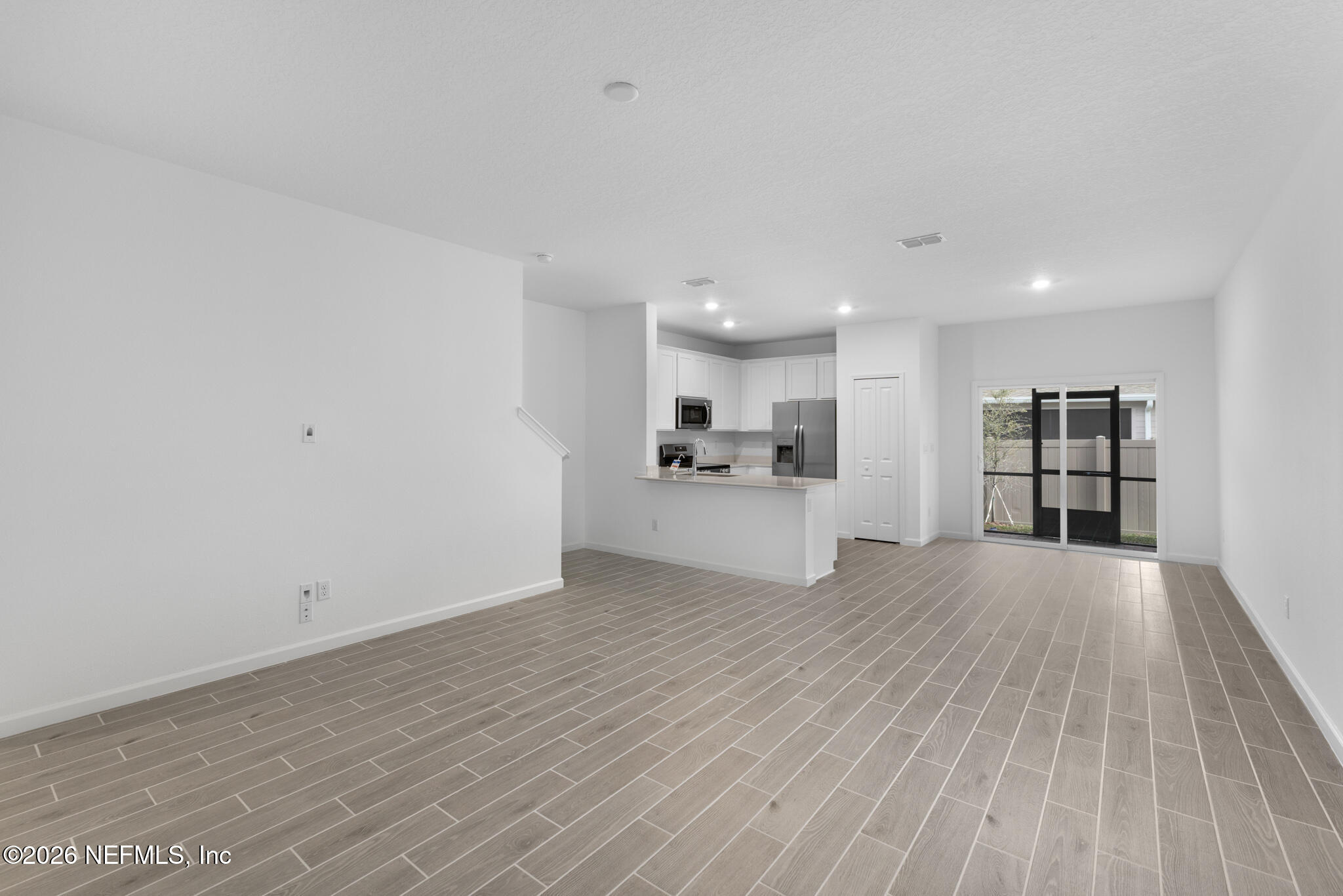 25 Craig Court St. Augustine, FL 32092 - Photo 6 of 25 a view of a kitchen with wooden floor