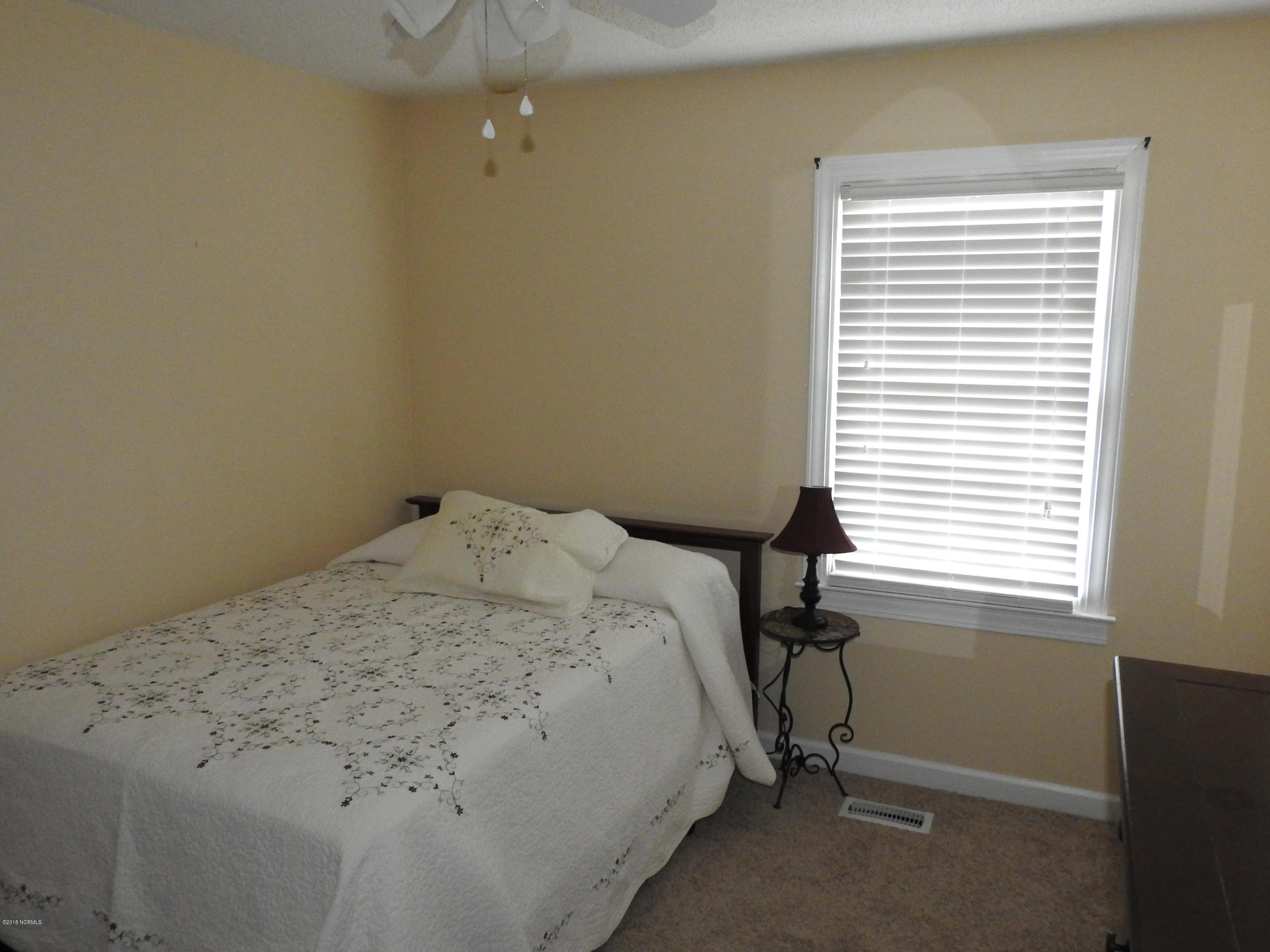 3865 Edwards Road Grimesland, NC 27837 - Photo 23 of 38 Guest Bedroom View 2