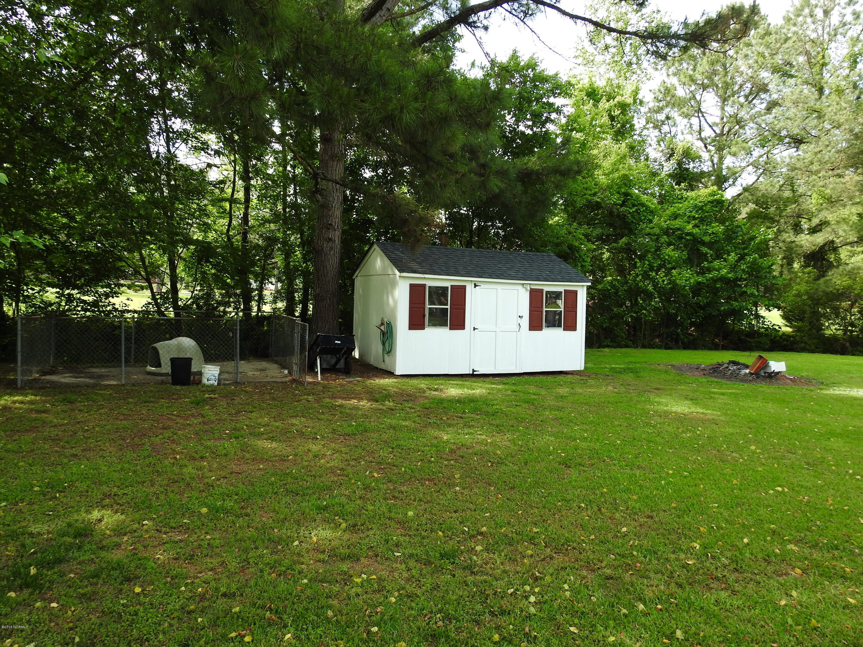 3865 Edwards Road Grimesland, NC 27837 - Photo 35 of 38 Storage shed