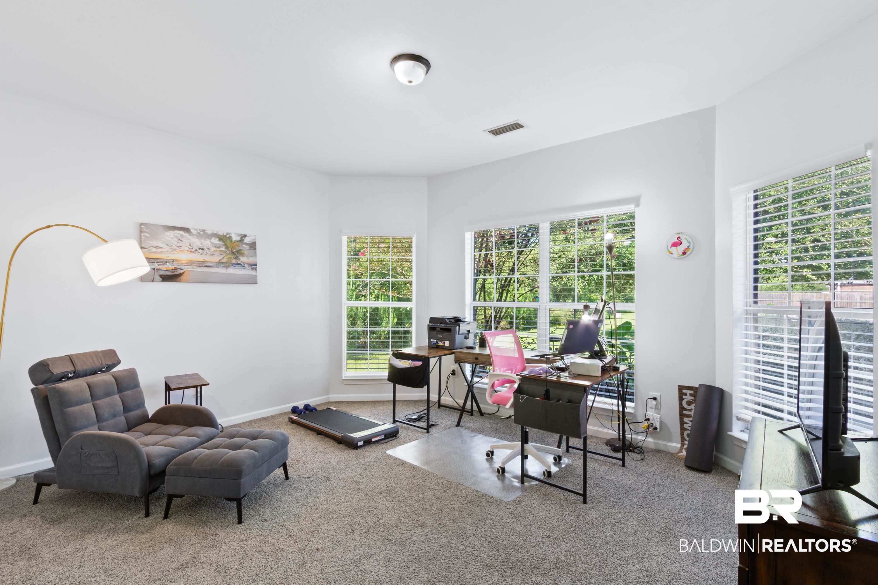 6846 Crimson Ridge Street Gulf Shores, AL 36542 - Photo 18 of 27 Home office featuring carpet floors and baseboards