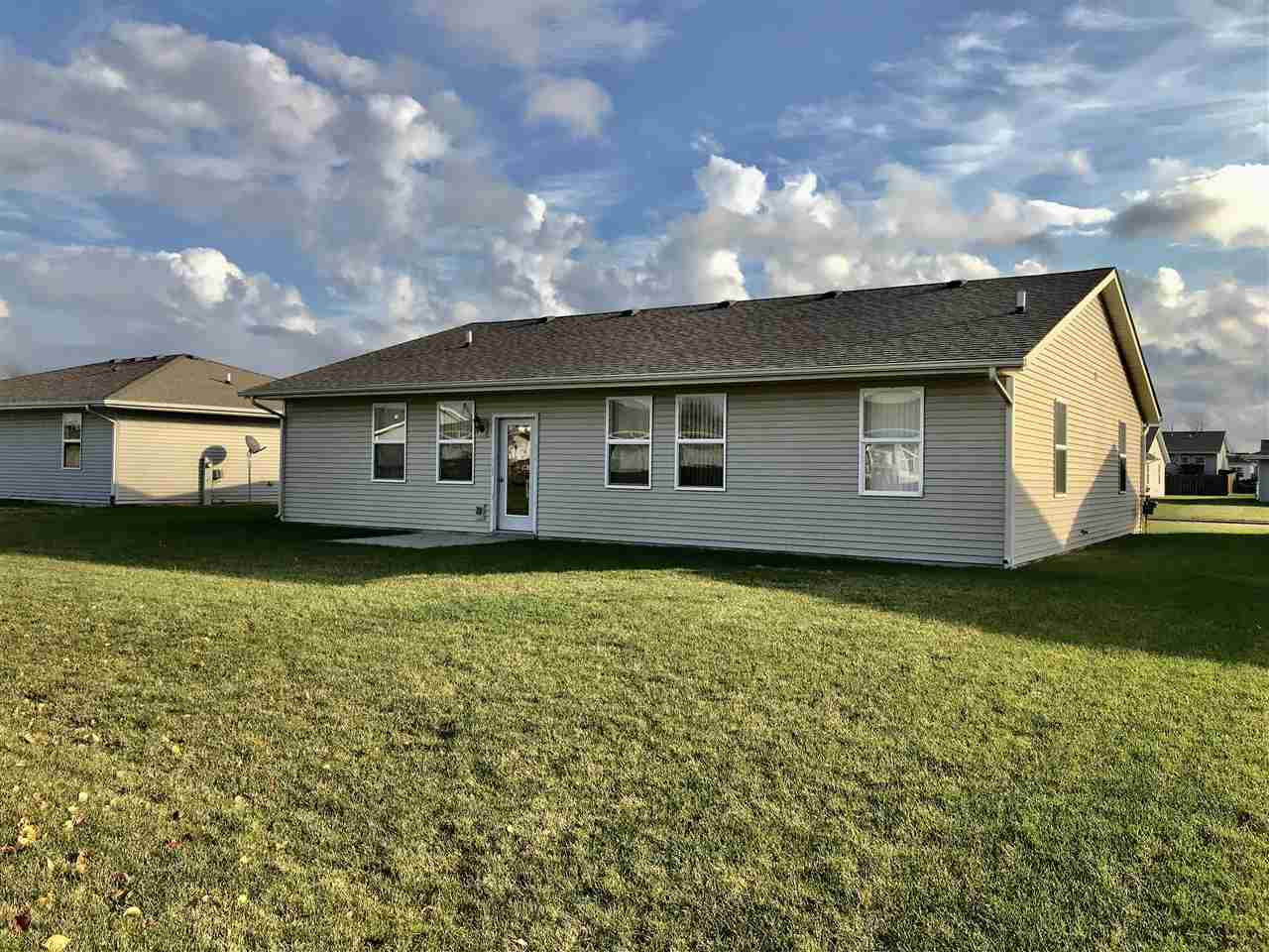 15612 Stonecrest Road South Beloit, IL 61080 - Photo 14 of 14 a view of a house with a backyard