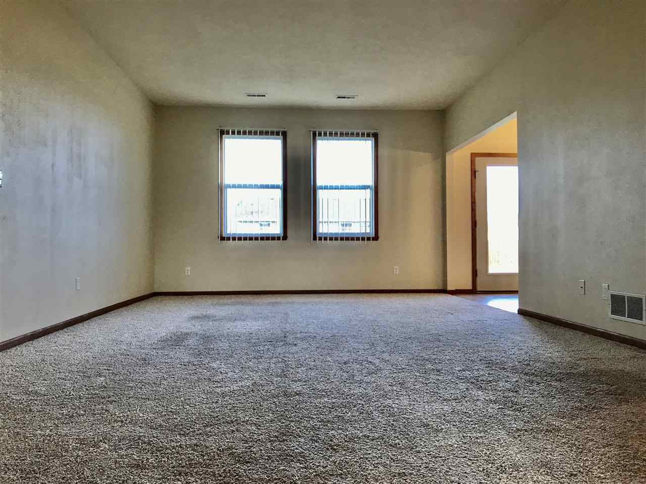 15612 Stonecrest Road South Beloit, IL 61080 - Photo 3 of 14 an empty room with a window