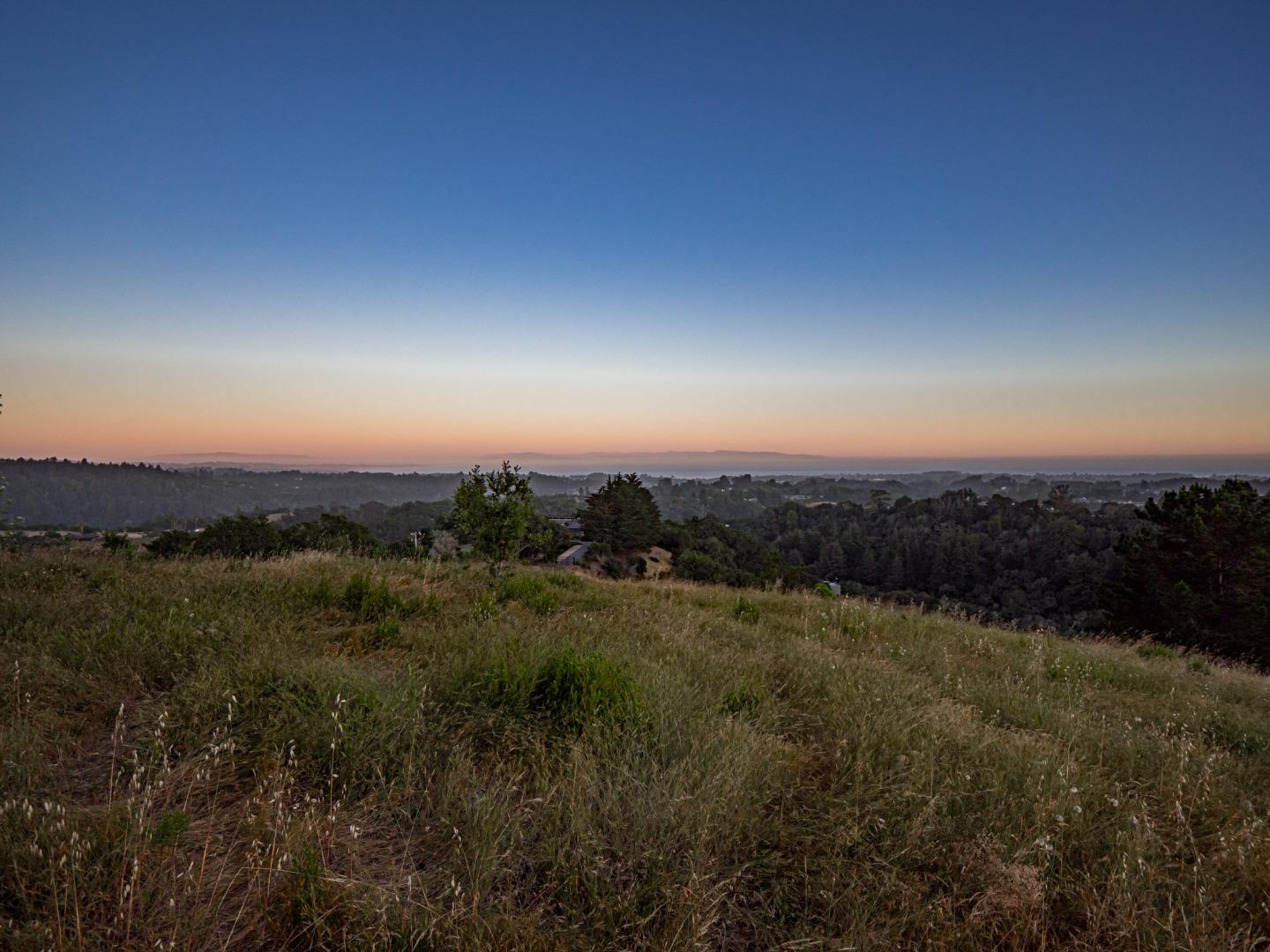 415 Muir Drive Soquel, CA 95073 - Photo 2 of 12 a view of a city with lush green forest
