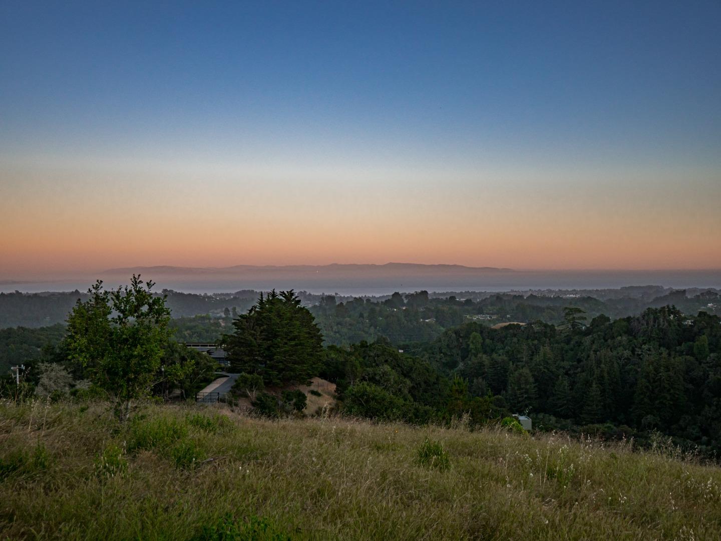 415 Muir Drive Soquel, CA 95073 - Photo 4 of 12 a view of a city with lush green forest