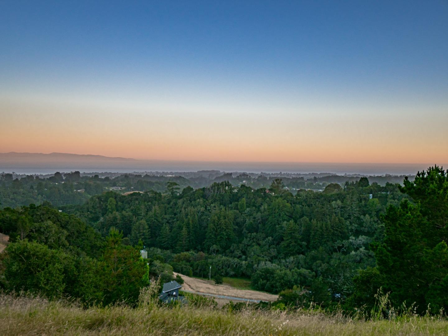 415 Muir Drive Soquel, CA 95073 - Photo 6 of 12 a view of a city with lush green forest