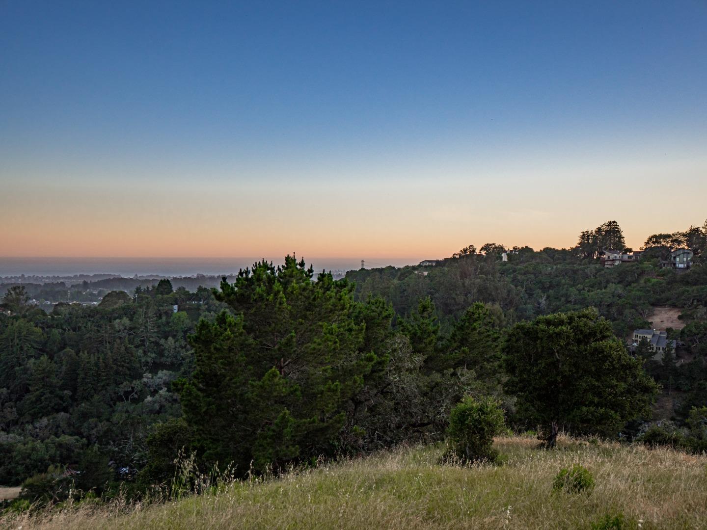 415 Muir Drive Soquel, CA 95073 - Photo 7 of 12 a view of a city with lush green forest