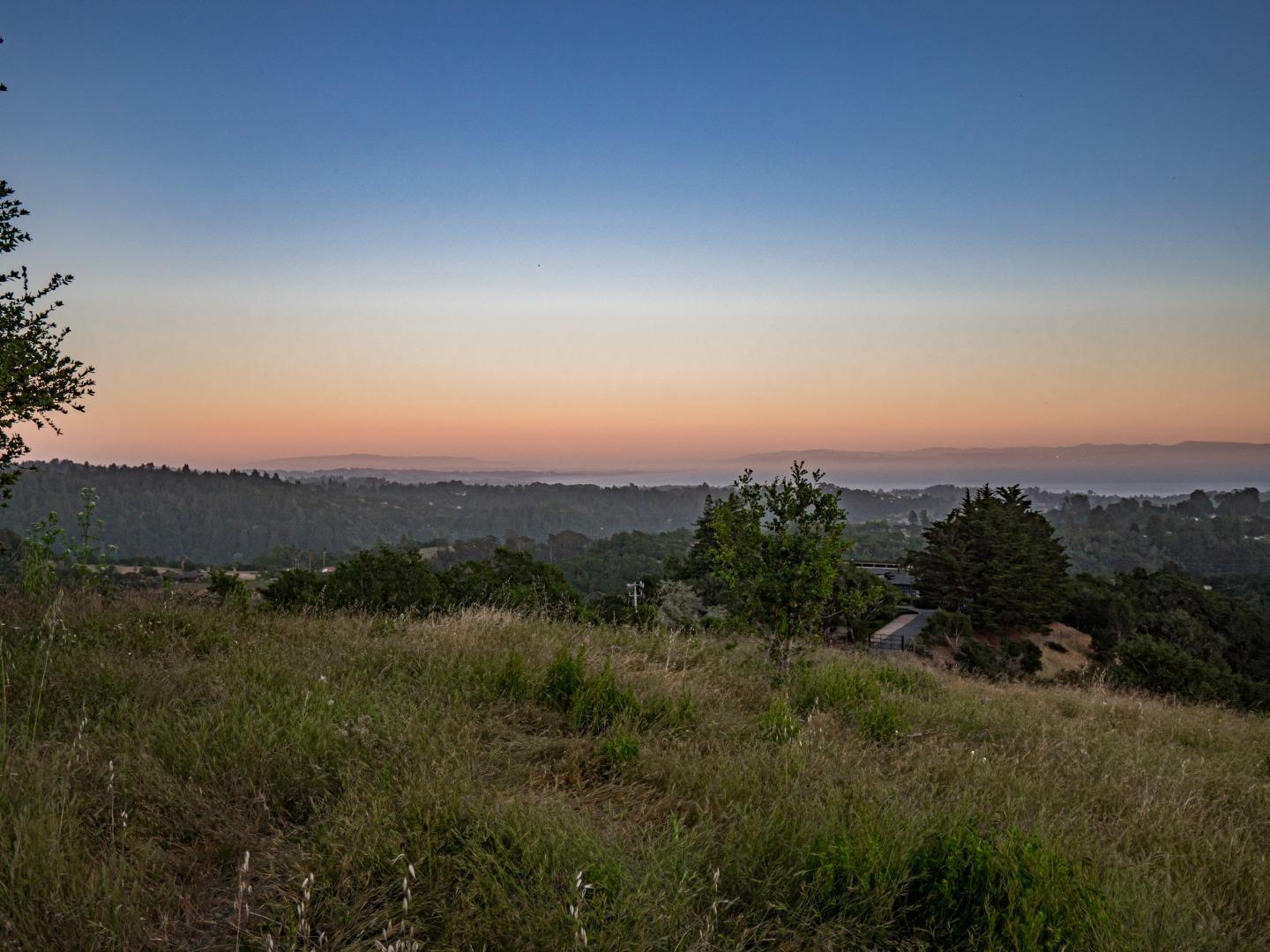 415 Muir Drive Soquel, CA 95073 - Photo 8 of 12 a view of a city with lush green forest