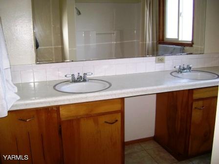 6303 Bell Road Yakima, WA 98901 - Photo 14 of 17 a bathroom with a sink and a mirror
