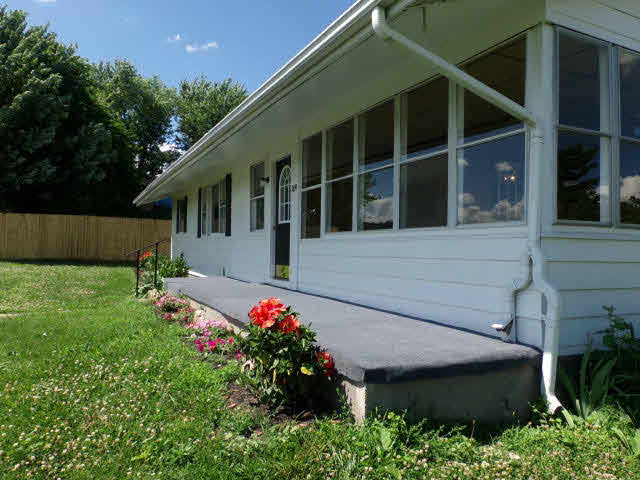 1659 Orchard Road Mount Jackson, VA 22842 - Photo 5 of 13 a front view of a house with a yard