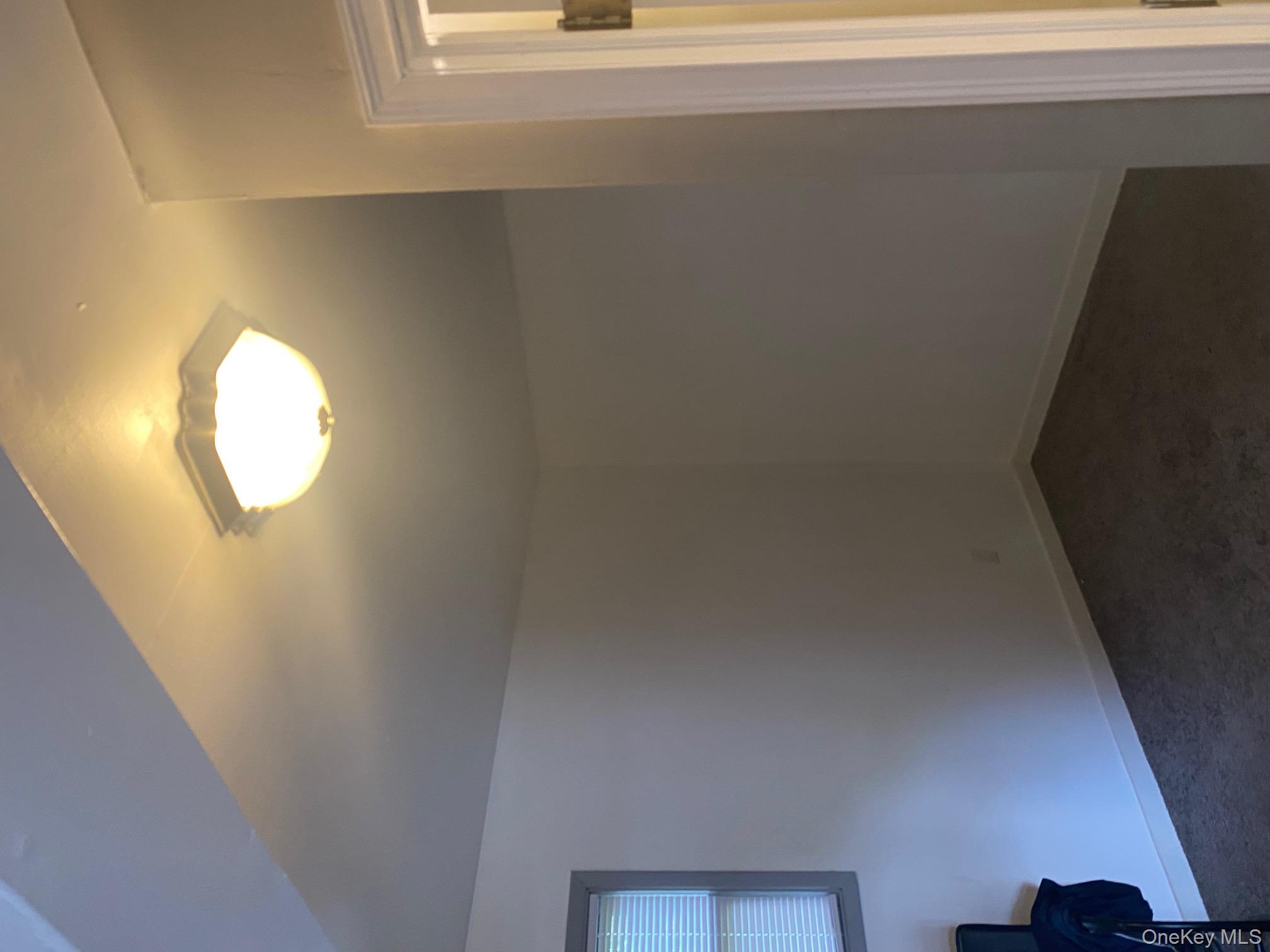 3 Burr Road Cochecton, NY 12726 - Photo 5 of 13 en empty room with a chair
