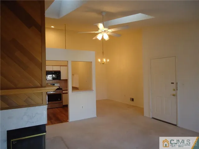 a kitchen with a stove and a microwave