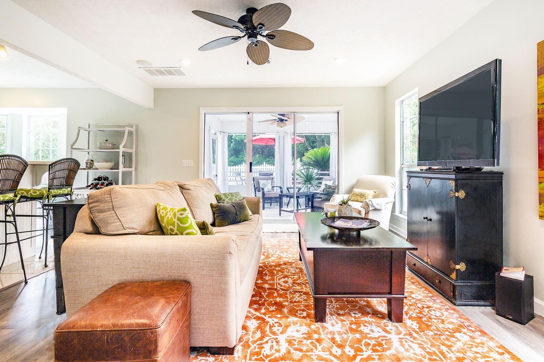 404 Seabreeze Circle Seacrest, FL 32461 - Photo 8 of 37 a living room with furniture and a window