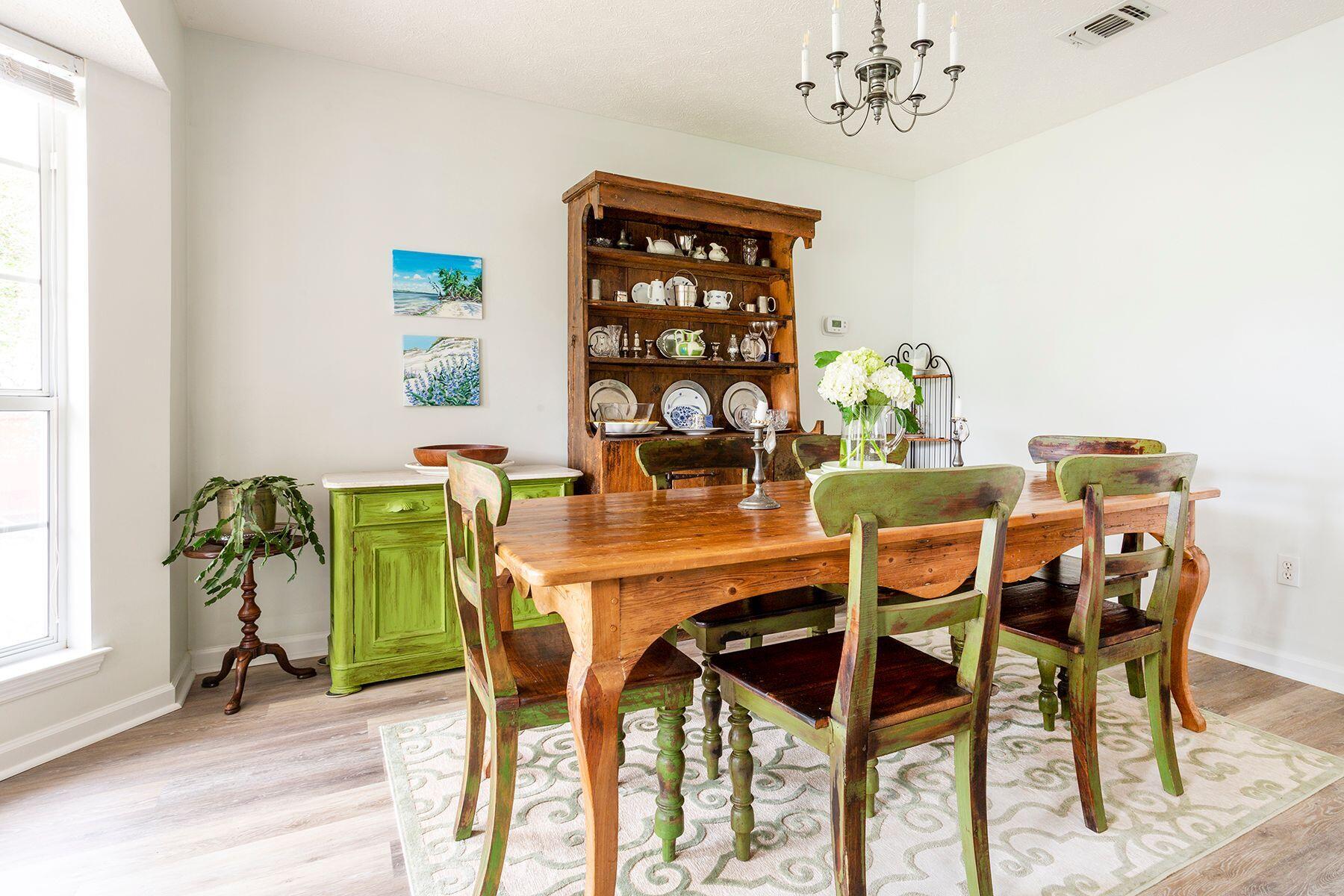 404 Seabreeze Circle Seacrest, FL 32461 - Photo 10 of 37 a dining room with furniture and chandelier