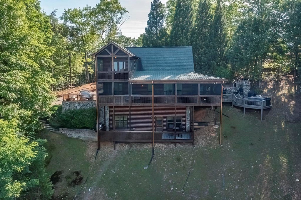 1722 Sun Rock Mountain Road Blue Ridge, GA 30513 - Photo 49 of 67 a front view of a house with a yard