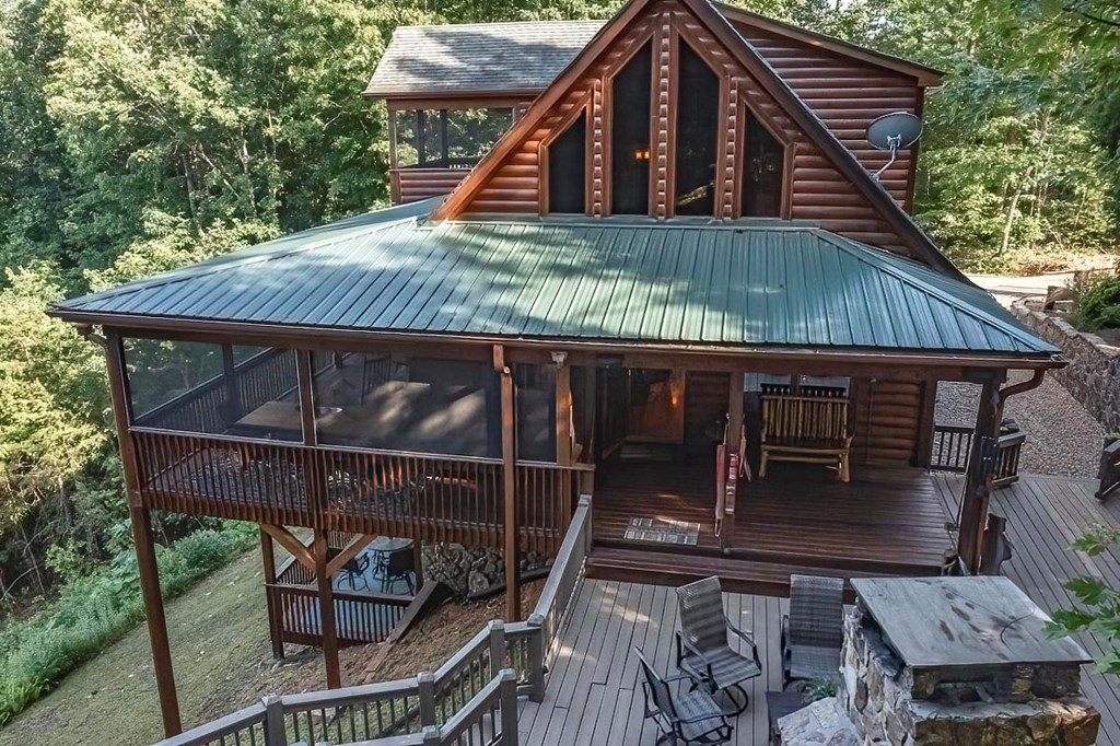 1722 Sun Rock Mountain Road Blue Ridge, GA 30513 - Photo 56 of 67 a view of house with roof deck front of house