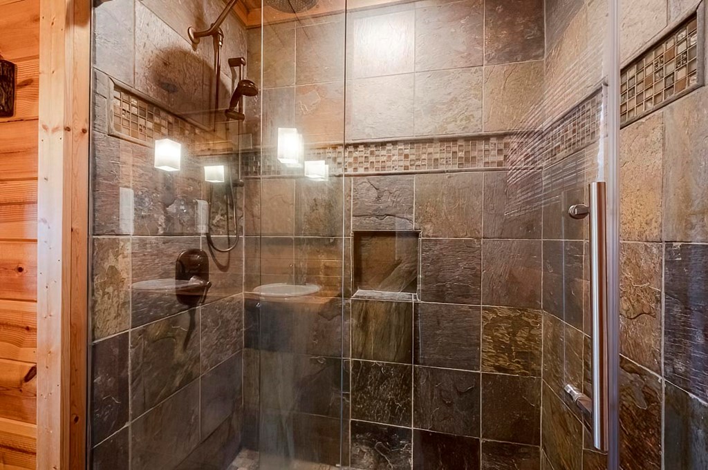 1722 Sun Rock Mountain Road Blue Ridge, GA 30513 - Photo 67 of 67 a bathroom with a shower
