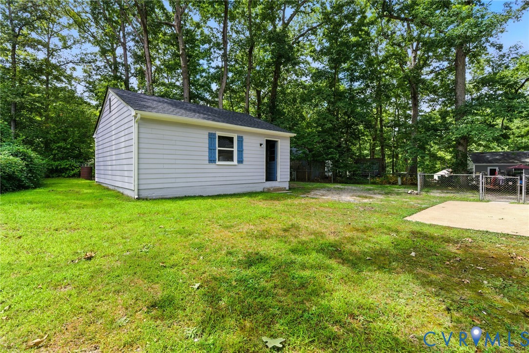 5430 Solaris Drive Chesterfield, VA 23832 - Photo 12 of 15 a view of a house with a backyard