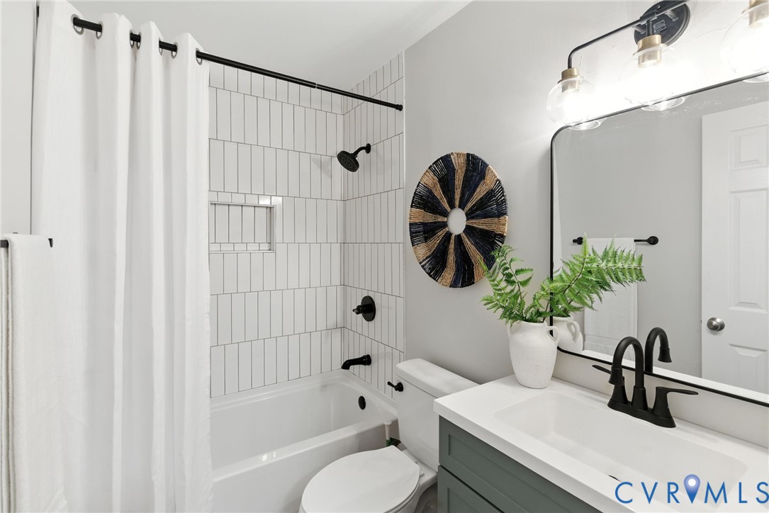 5430 Solaris Drive Chesterfield, VA 23832 - Photo 10 of 15 a bathroom with a sink toilet and shower