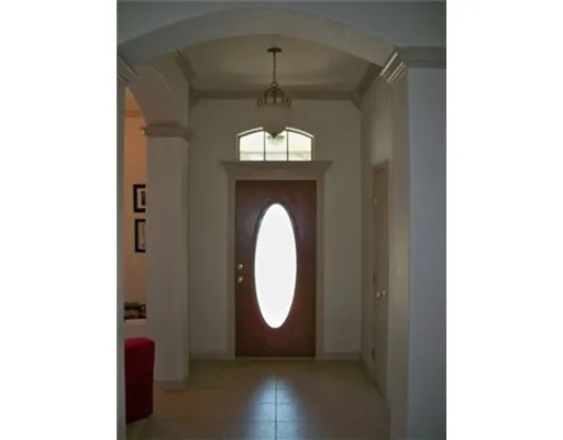 a view of a hallway with windows