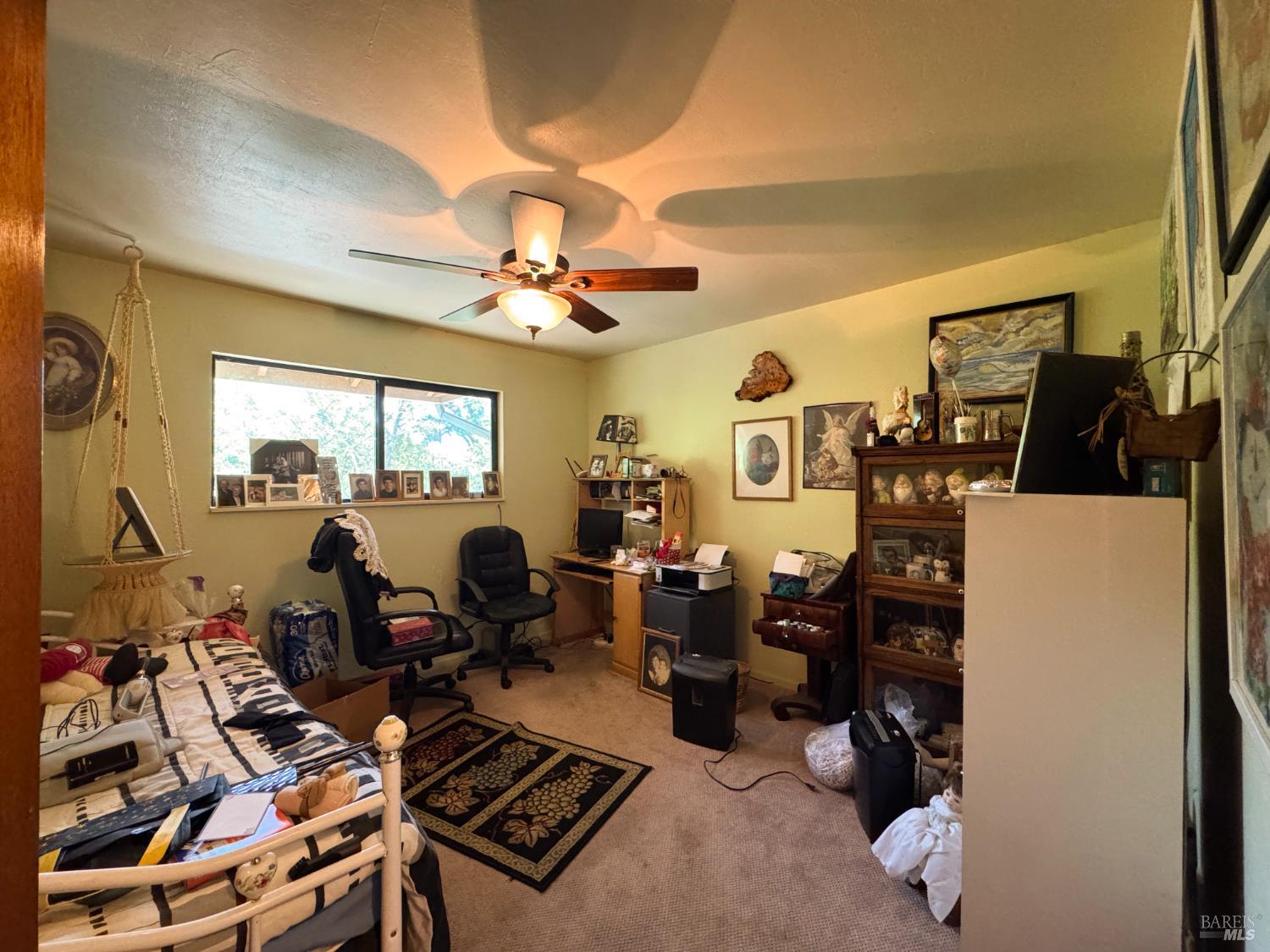 4400 Lake Ridge Road Ukiah, CA 95482 - Photo 13 of 78 a room with gym equipment and a large window