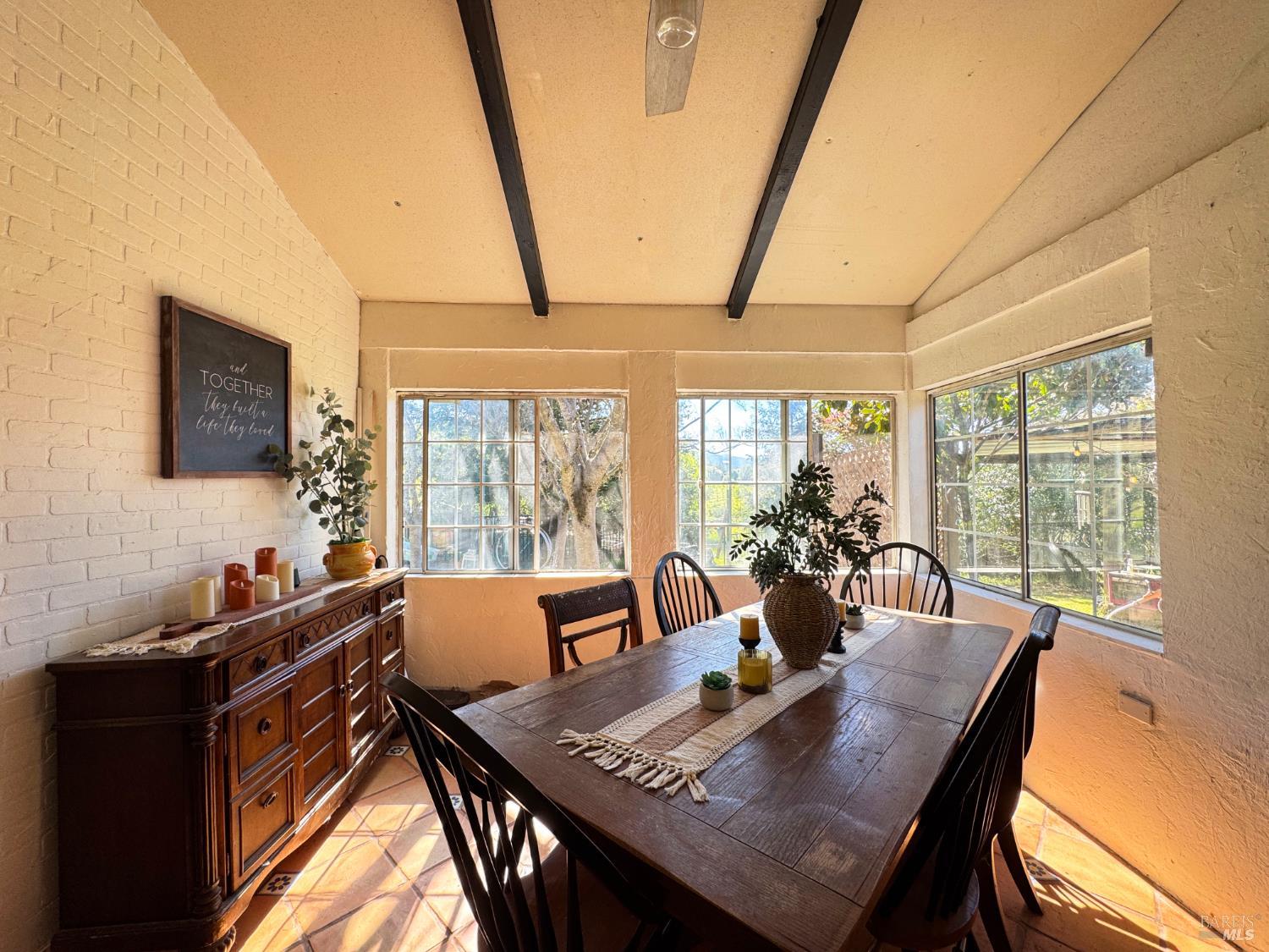 4400 Lake Ridge Road Ukiah, CA 95482 - Photo 26 of 78 a view of a dining room with furniture window and outside view