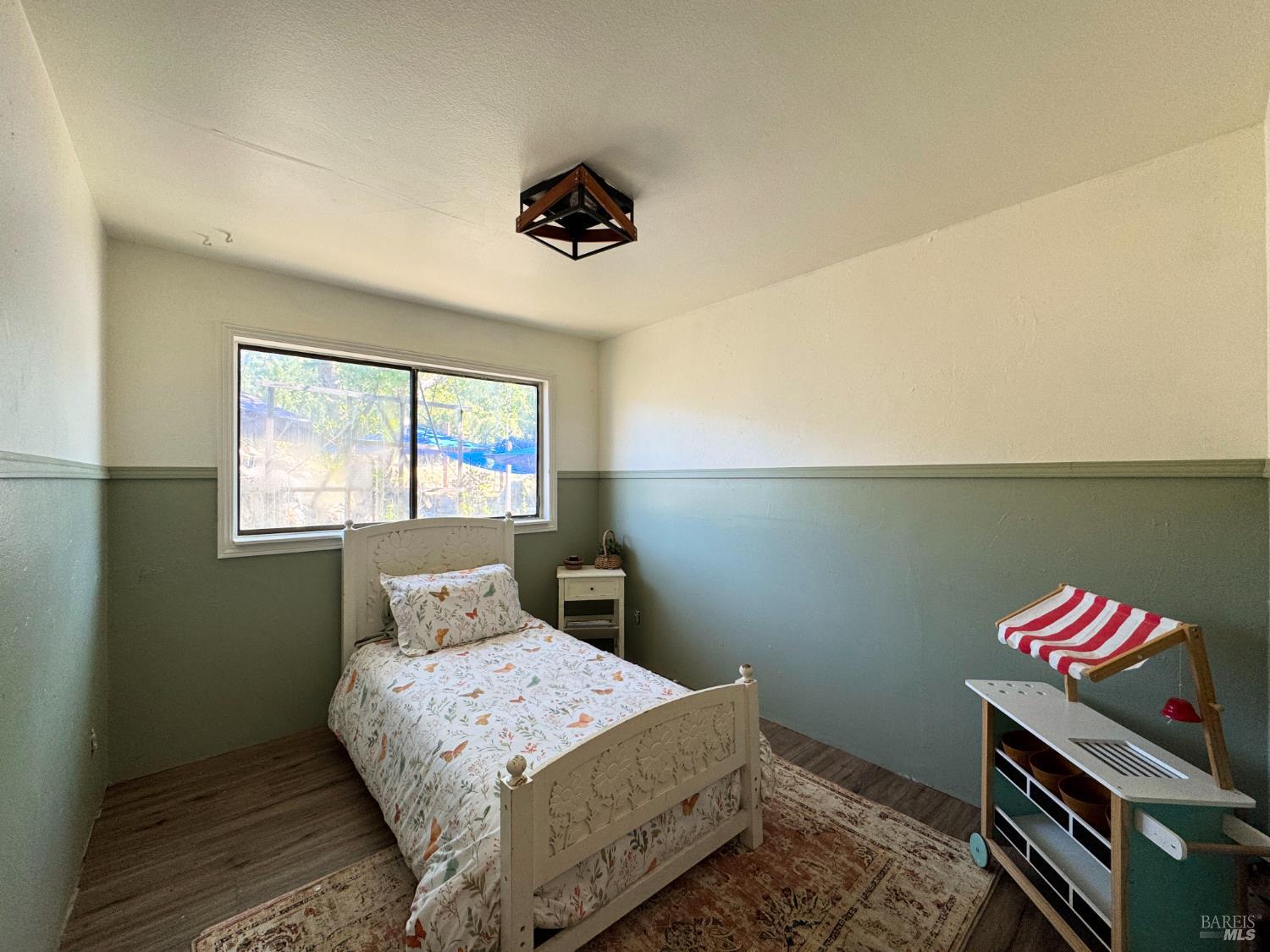 4400 Lake Ridge Road Ukiah, CA 95482 - Photo 36 of 78 a bedroom with a bed and a window
