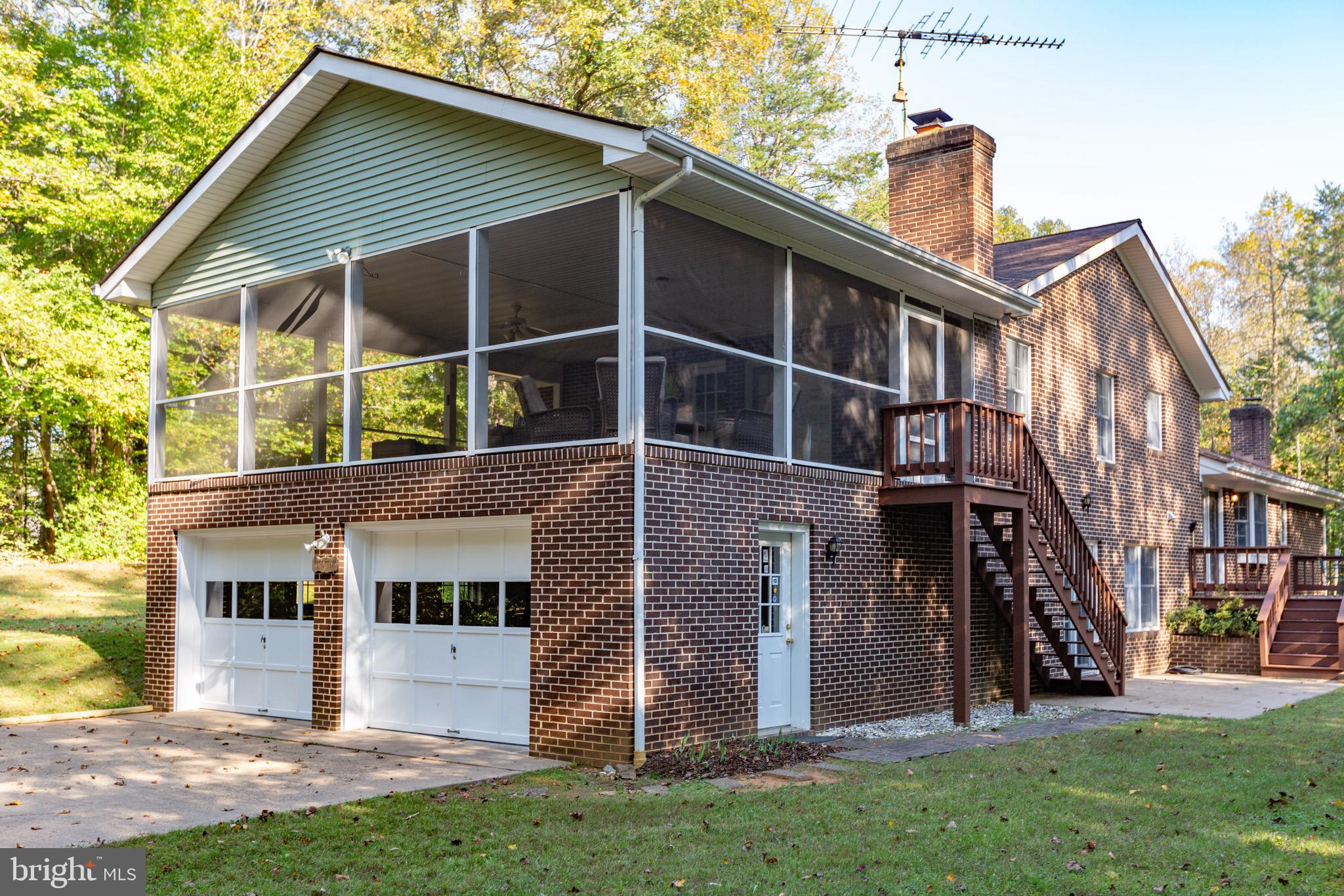 14182 Tower Road Unionville, VA 22567 - Photo 45 of 55 Screened in Porch over 2-Car Attached Garage